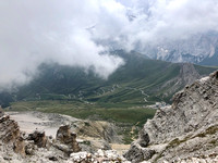 View from the Sella Massfi toward Marmolada (behind the clouds)