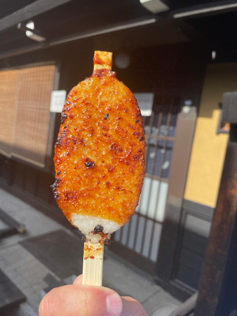 Gohei mochi is a rice cake glazed with soy and miso and grilled on a skewer