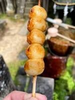 Mitarashi dango are grilled rice dumplings on a skewer, glazed in sweet soy