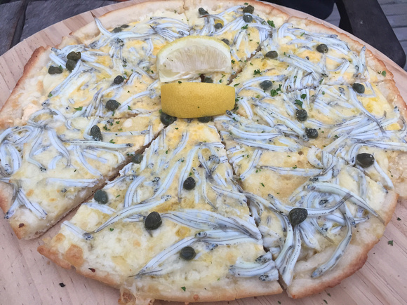 Whitebait pizza in Hokitika (yes, those are eyes you see)