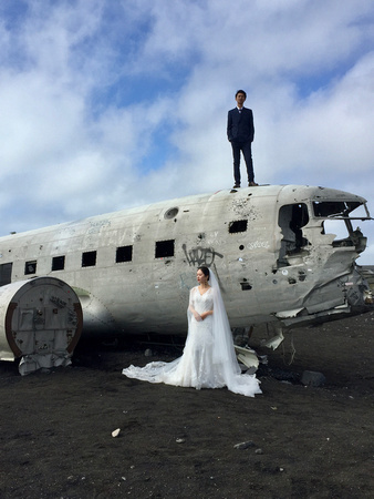 Remains of the Navy plane at Sólheimasandur beach, with a very elaborate three-camera wedding shoot
