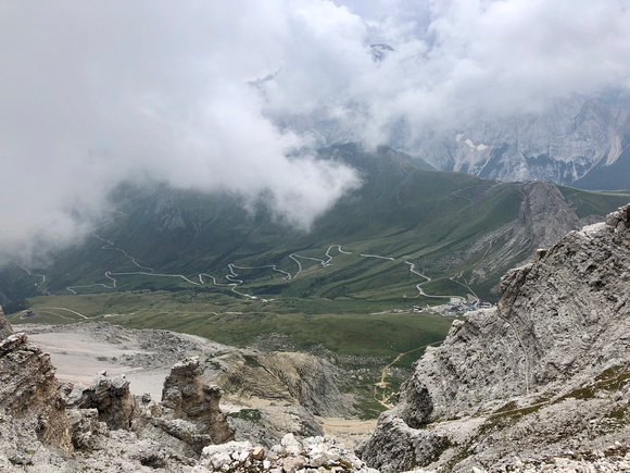 View from the Sella Massfi toward Marmolada (behind the clouds)