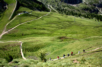 Hikers descending toward the Comici Hutte